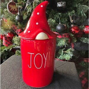Joy candle by Rae Dunn with gnome, topper, and gorgeous glossy sugar cookie scnt